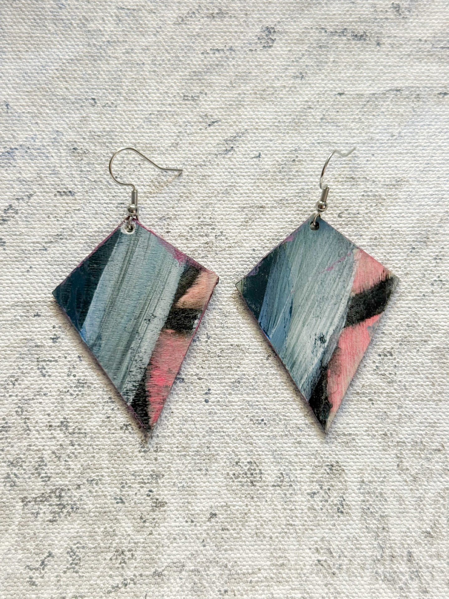Comfortable earrings pink blue and black made by an artist hand painted