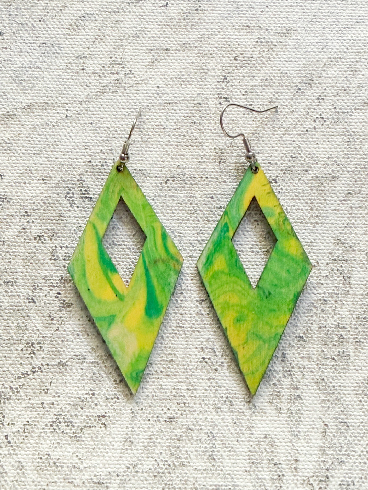 bright lime and yellow Wearable art earrings by UK abstract artist